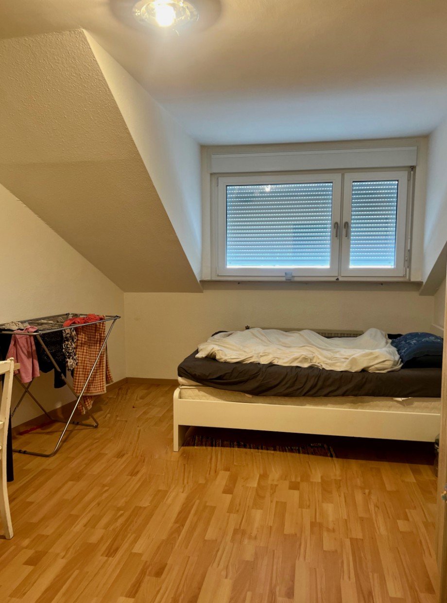 Schlafzimmer_Racano Immobilien Dachgeschosswohnung Darmstadt