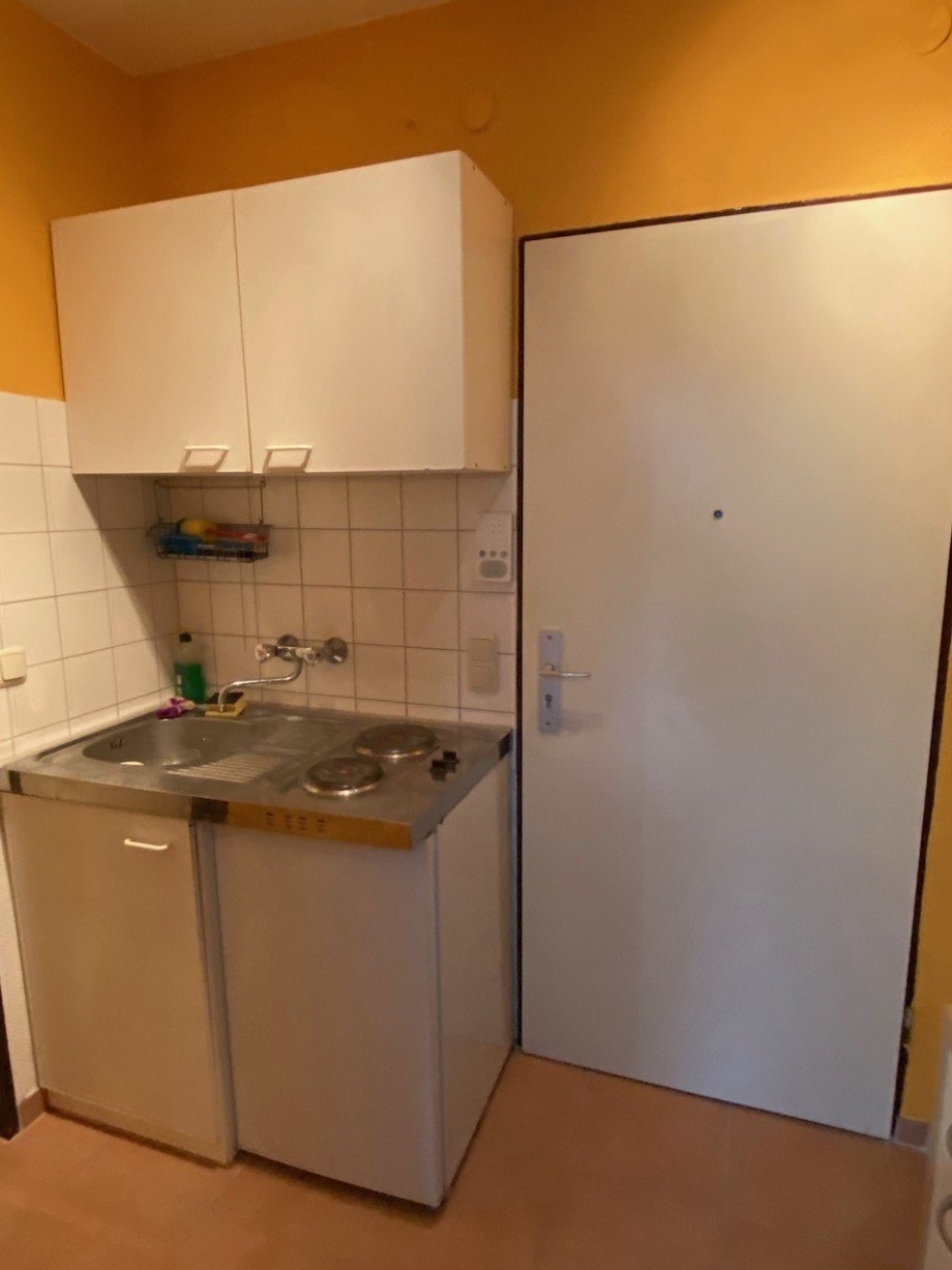 Eingangsbereich mit Kochnische Etagenwohnung Darmstadt