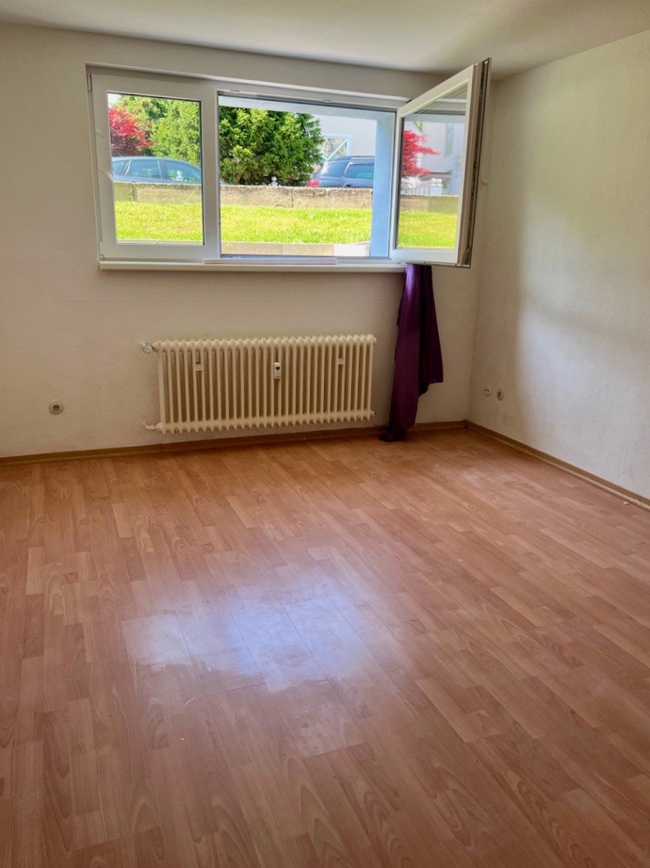 Racano Immobilien Wohnzimmer Souterrainwohnung Offenbach