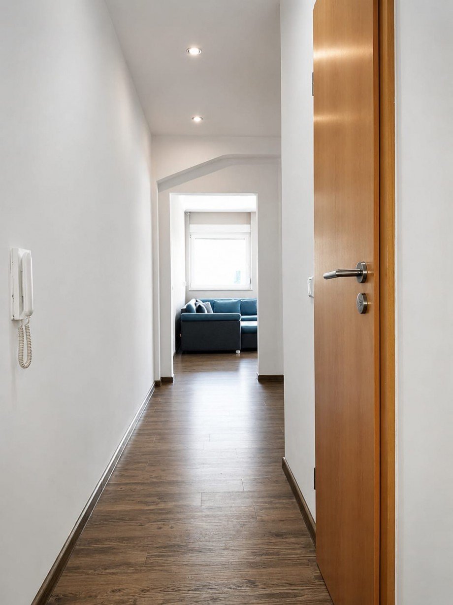 Flur zum Wohnzimmer Braun Racano Immobilien Wohnung Darmstadt