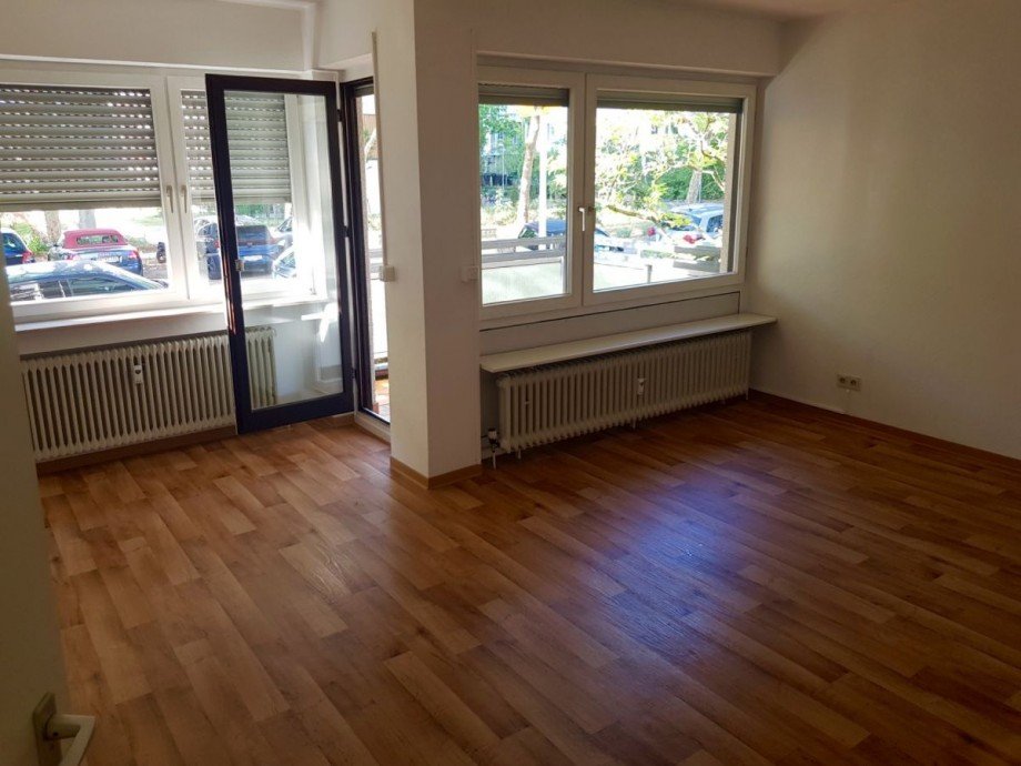 Racano Immobilien_Wohnzimmer Etagenwohnung Darmstadt