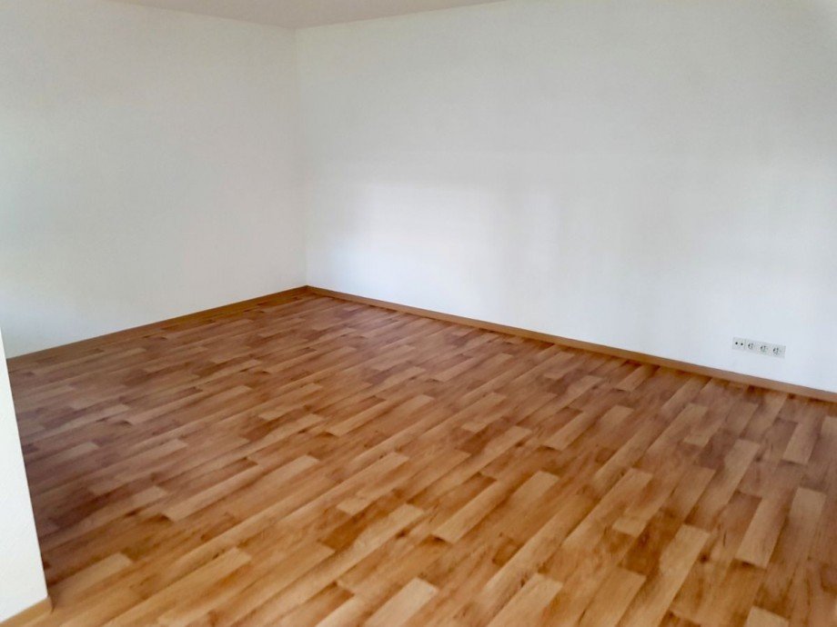 Racano Immobilien_Wohnzimmer 2 Etagenwohnung Darmstadt