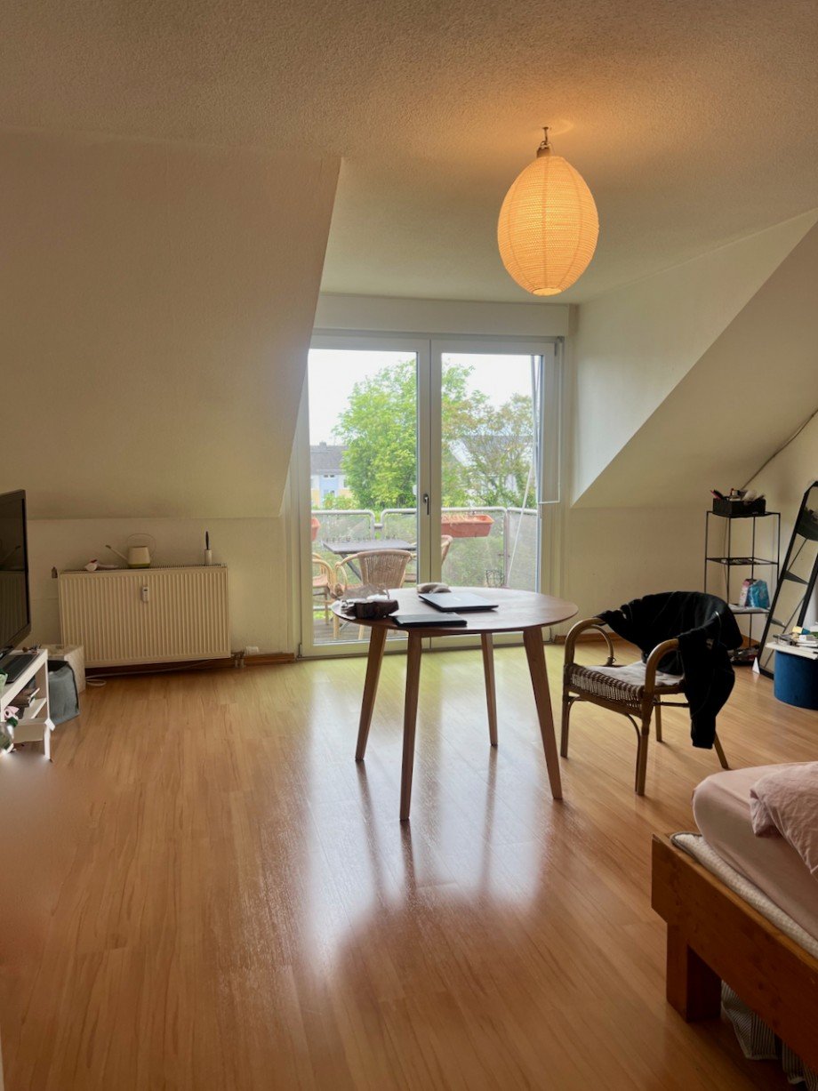 Wohnzimmer_Racano Immobilien Dachgeschosswohnung Darmstadt