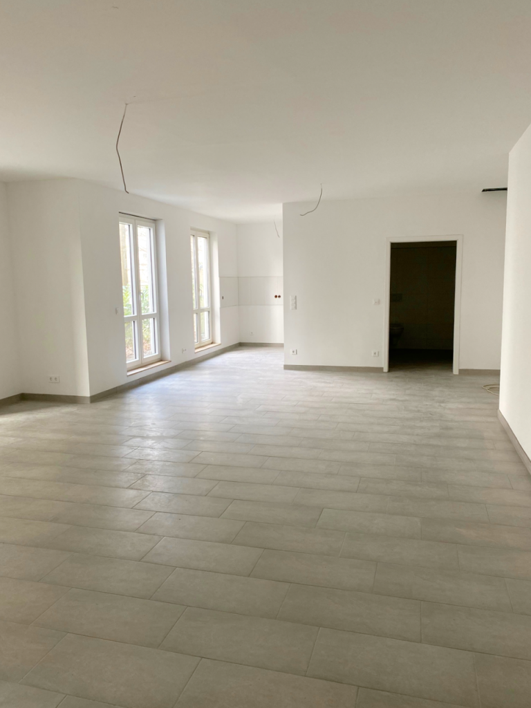 offener Wohnbereich mit K�che Darmstadt Erdgeschosswohnung *Erstbezug* Moderne 2 Zimmer EG Wohnung in Bessungen mit Wintergarten und Au�enbereich