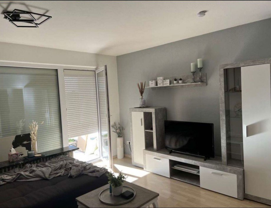 Racano Immobilien - Wohnzimmer Wohnung Messel