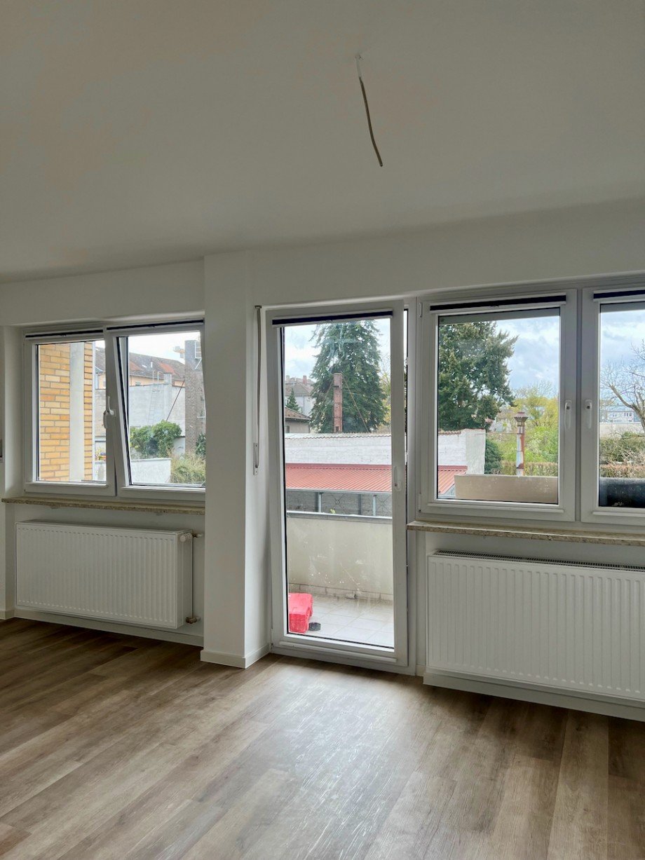 Wohnzimmer Whg.li Innenstadt RacanoImmobilien.jpeg Etagenwohnung Darmstadt