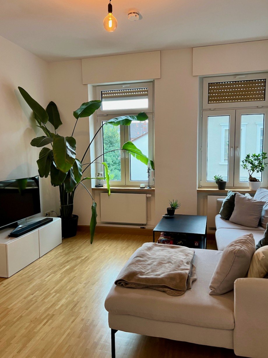 Racano Immobilien Wohnzimmer Etagenwohnung Darmstadt