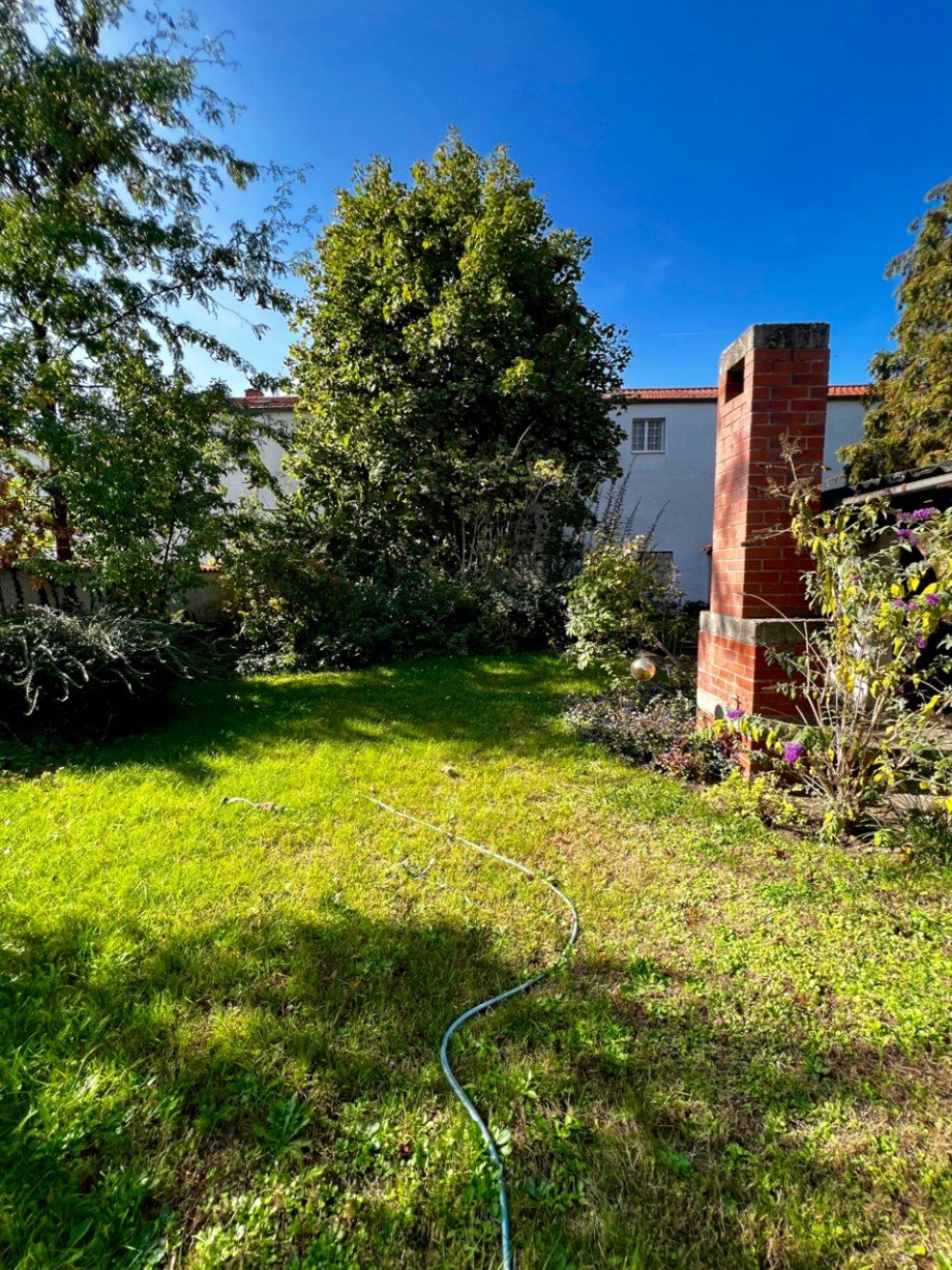 Racano Immobilien_Garten Einfamilienhaus Lampertheim