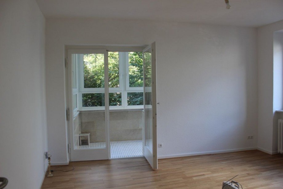 Wohnzimmer mit Wintergarten Erdgeschosswohnung Darmstadt