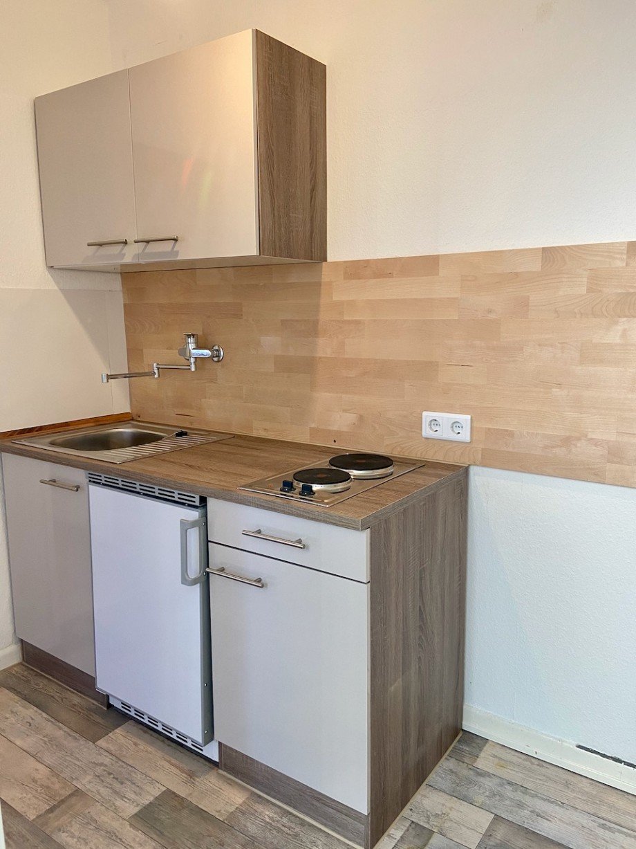 Eingangsbereich mit Kochnische Etagenwohnung Darmstadt