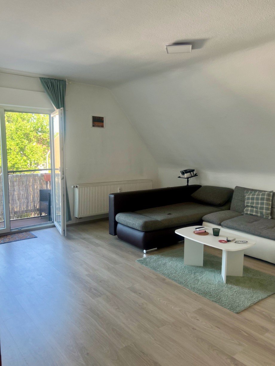 Heimst�ttensiedlung 2.OG:Wohnzi Racano Immobilien Etagenwohnung Darmstadt