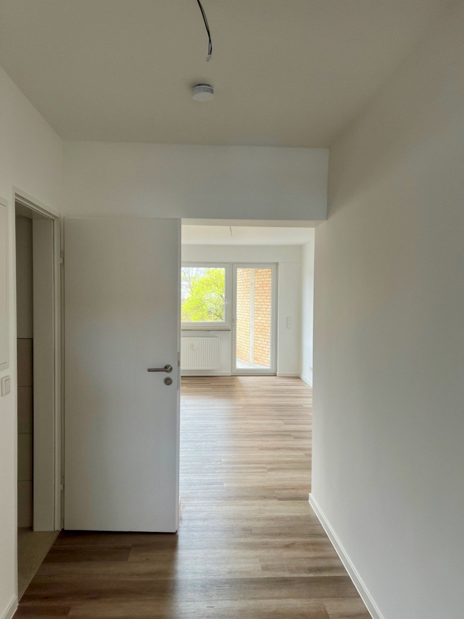 Flur mit Wohnzi Whg.re Innenstadt Racano Immobilien.jpeg Etagenwohnung Darmstadt