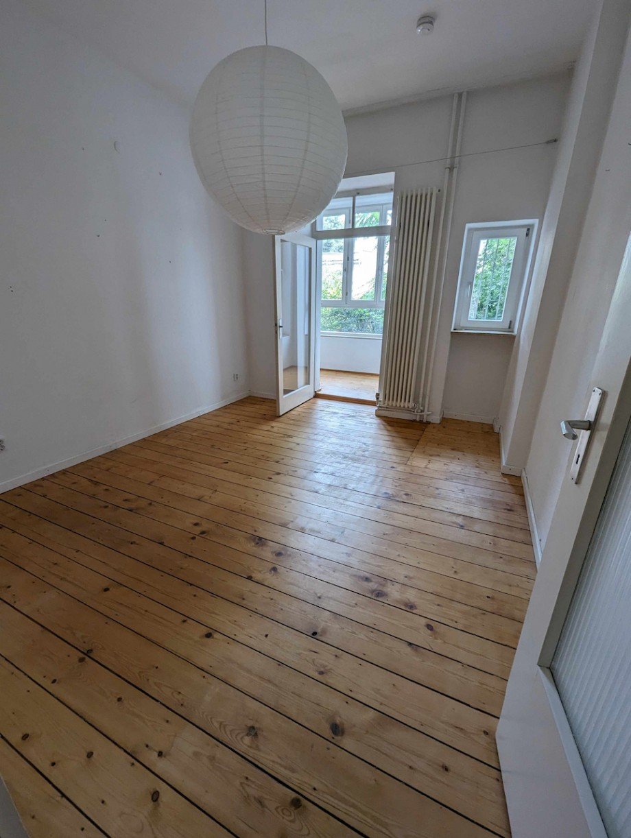 Racano Immobilien Wohnzimmer Erdgeschosswohnung Darmstadt