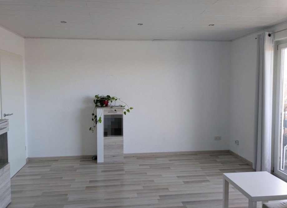 Racano Immobilien Wohnzimmer Etagenwohnung Messel