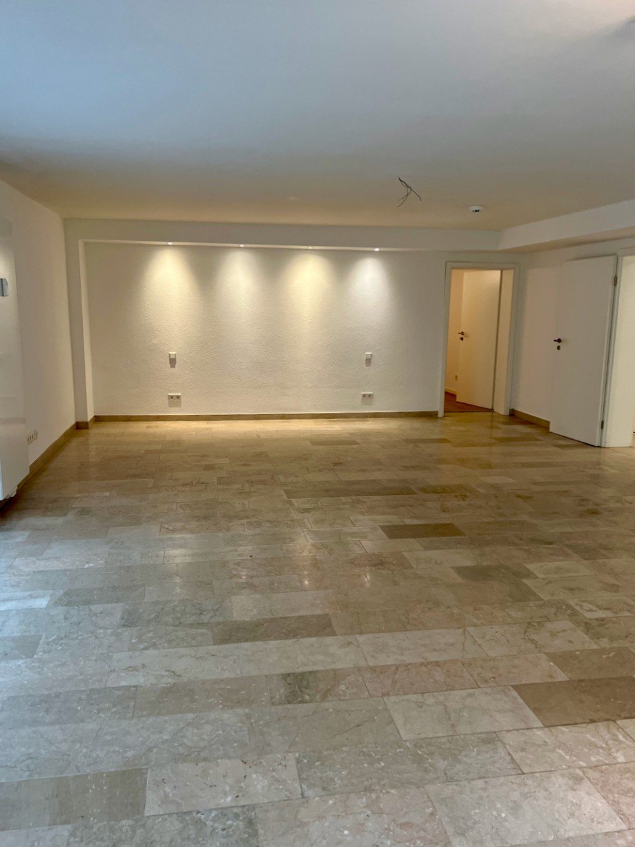 Racano Immobilien_Wohnzimmer Souterrainwohnung Darmstadt