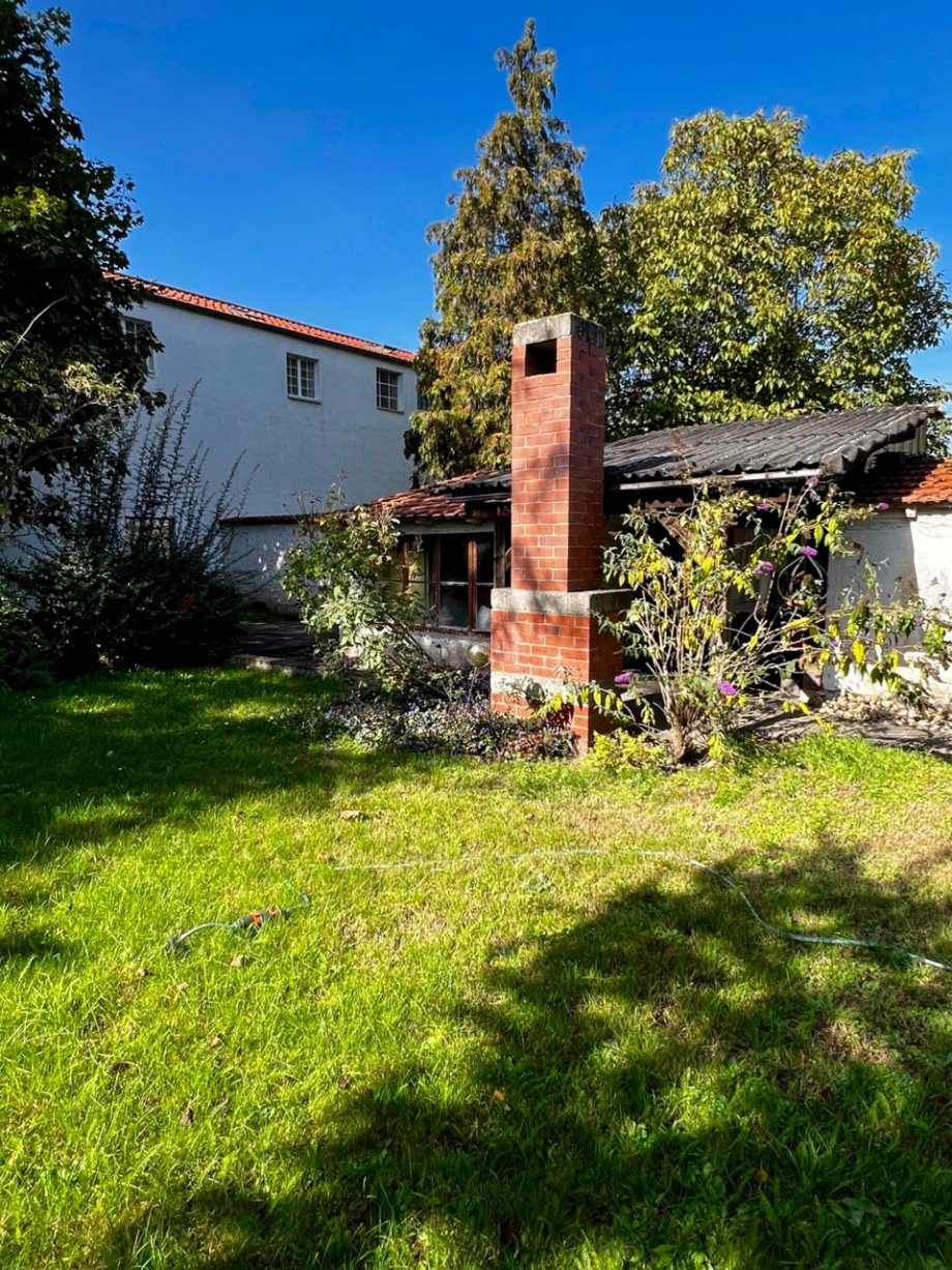 Racano Immobilien_Gartenfl�che mit Nebengeb�ude Einfamilienhaus Lampertheim