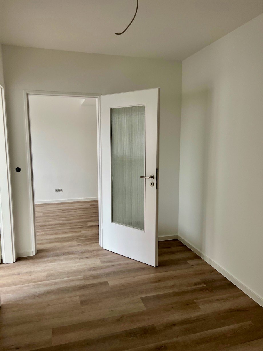 Durchgangszimmer Whg.li Innenstadt RacanoImmobilien.jpeg Etagenwohnung Darmstadt