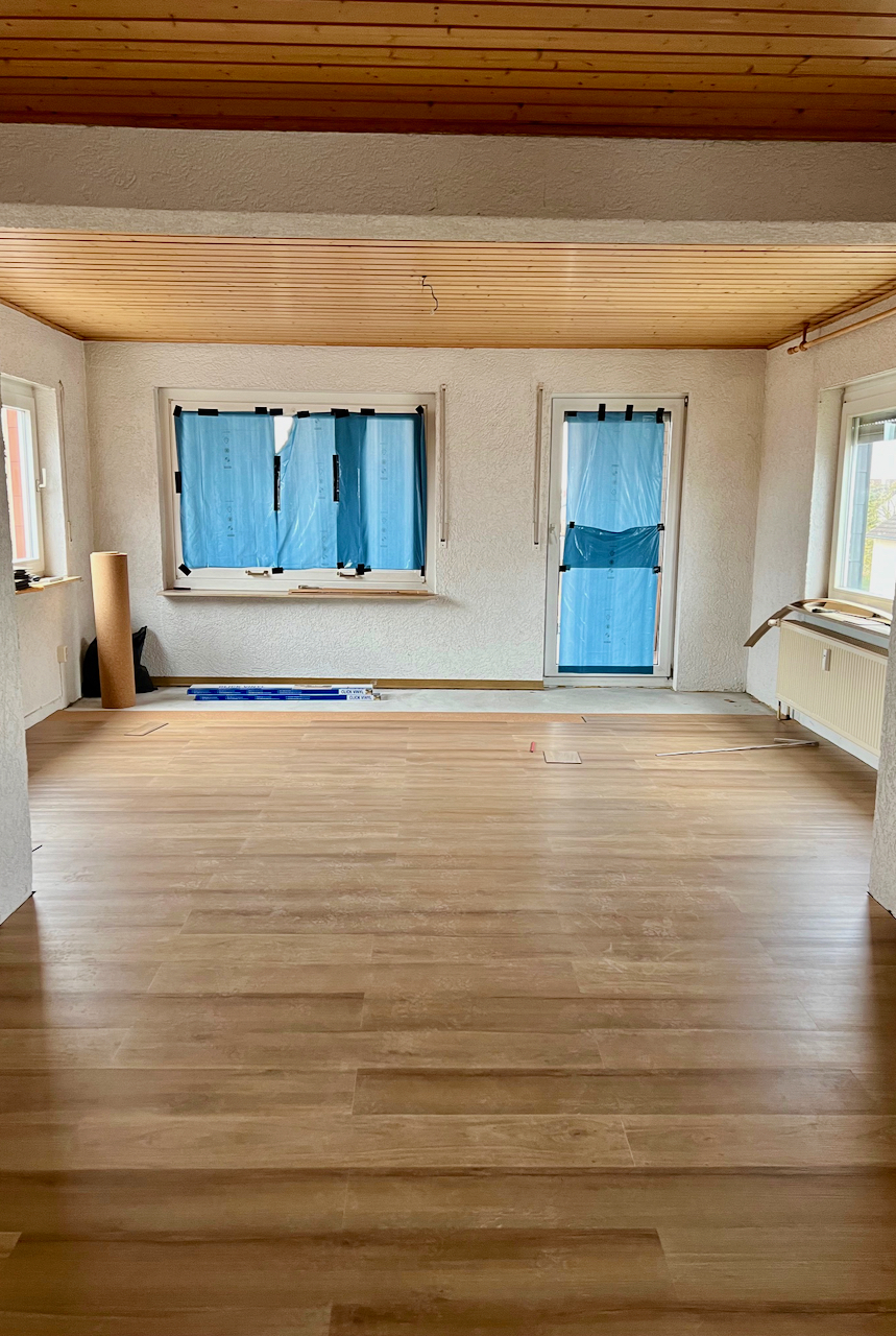 Racano Immobilien Wohnzimmer 1 Dachgeschosswohnung Messel